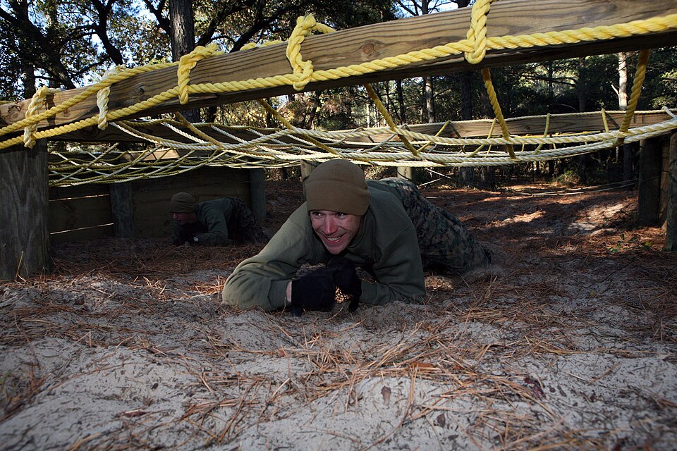 Marine crawling through an obstacle course